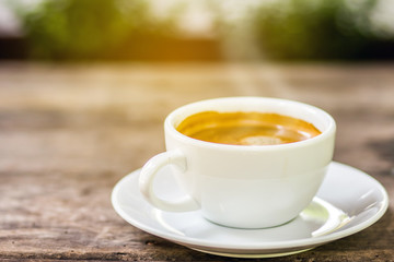 Coffee cup on a wooden table.