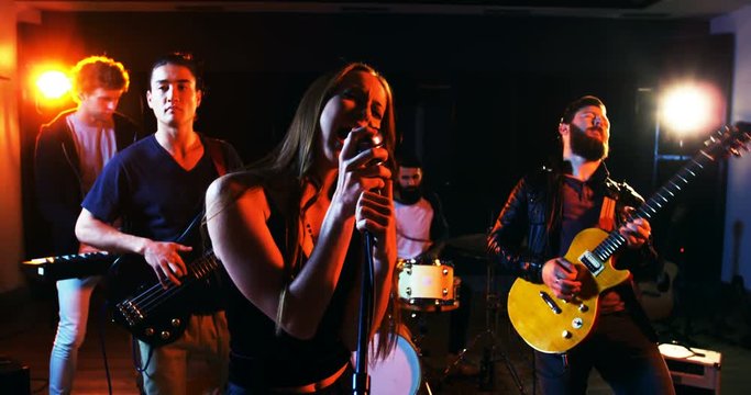 Band performing in studio