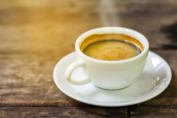 Coffee cup on a wooden table.