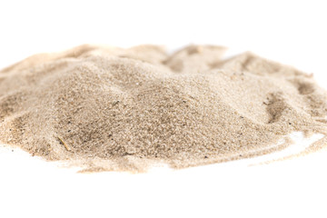 pile of sand isolated on white background, close up