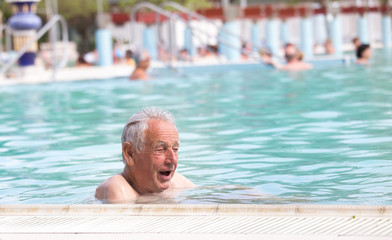 Fototapeta premium Senior man in swimming pool