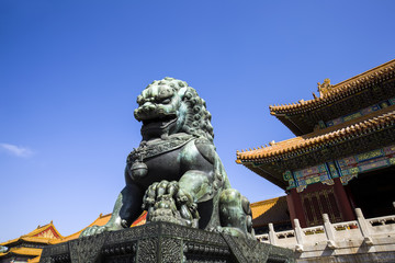 Fototapeta na wymiar Copper lion of the imperial palace in Beijing, China