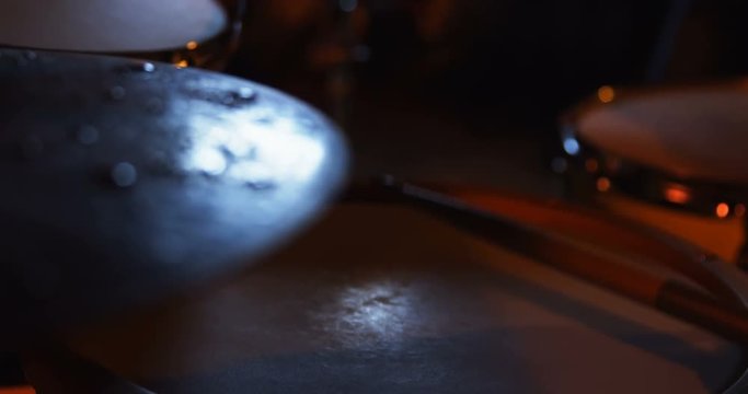 Drummer playing drum in studio