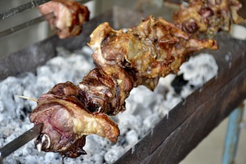 Detail of pork meat cooked on a grill