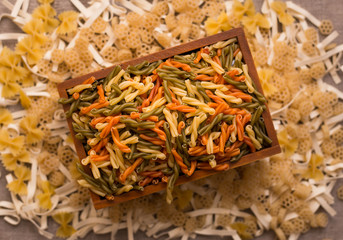 pasta loose in a wooden box
