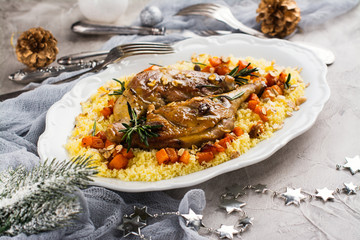 Christmas roast duck legs and couscous