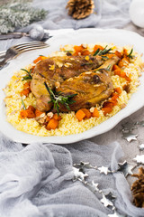 Christmas roast duck legs and couscous