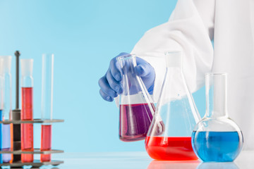 Experiments in a chemistry lab. conducting an experiment in the laboratory.