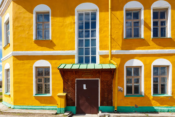 Obraz na płótnie Canvas Yellow building of crafts Kostyukovichi Belarus