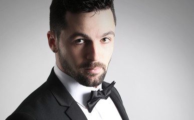 Portrait of an handsome man wearing a bow tie 
