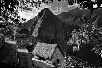 View of the ancient Inca City of Machu Picchu. The 15-th century Inca site.'Lost city of the Incas'. Ruins of the Machu Picchu sanctuary. UNESCO World Heritage site. Black and white