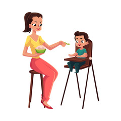 Mother feeding her son sitting in baby high chair, cartoon vector illustration isolated on white background. Mother, mom holding bowl of porridge, spoon feeding her son in high chair
