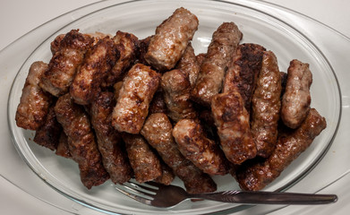 plate with grilled cevapcici balkan cuisine
