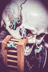 macro of miniature figurine of people , explore