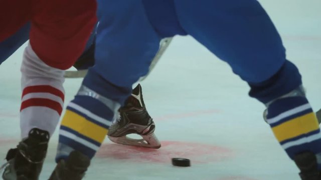 Opposing hockey teams playing match, players body checking rivals on ice rink