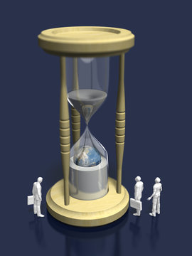 Business figures looking at the hourglass that enters the earth and is likely to be buried