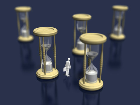 Business figure looking at the hourglass