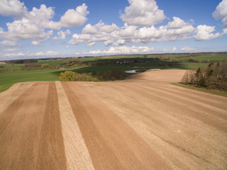 Aerial view of beautiful  agricultural fields  in the german countryside. It is a clear, bright Spring day