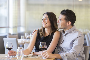 Fototapeta premium happy young couple in a restaurant