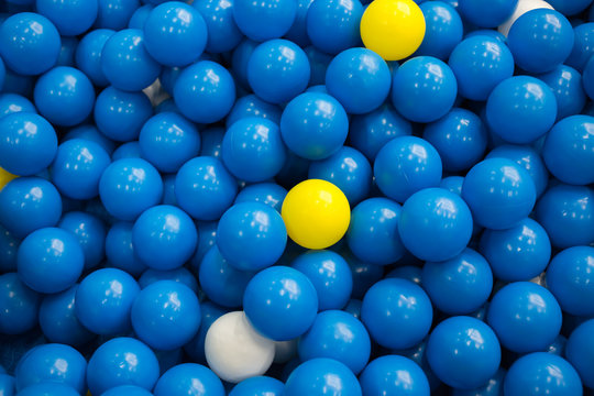close up of plastic colorful blue ball at the playground
