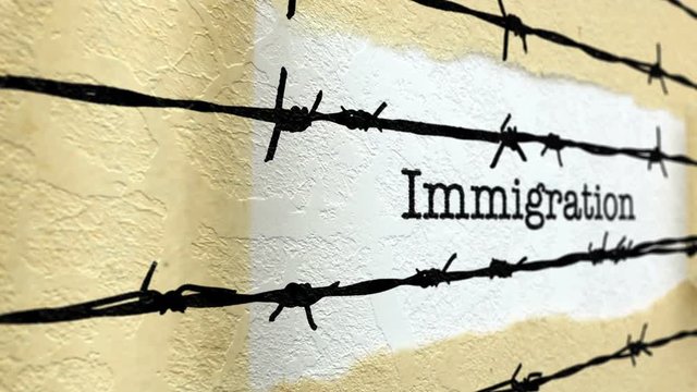 Immigration text against barbwire