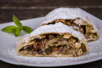 Slice of an apple strudel on a plate