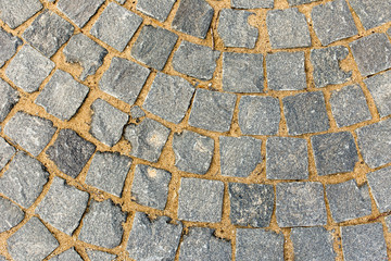 Brick pavement tile, top view. Texture as background.