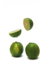 fresh green lime over white background