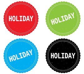 HOLIDAY text, on round wavy border stamp badge.