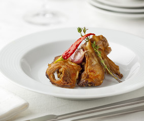 Spicy fried goat cutlets with garlic and chili pepper.