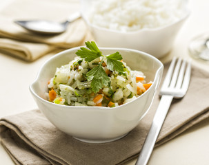 Rice salad with vegetables in a bowl