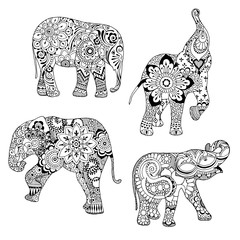A set of elephants decorated with patterns in the style of mihendi.