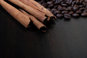 Coffee beans and cinnamon sticks.