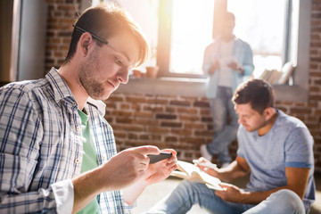 young professionals working on new business project in small business office