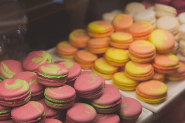 Colorful macaroons on shelf