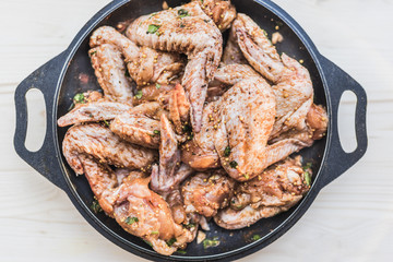 Chicken wings marinated for barbecue
