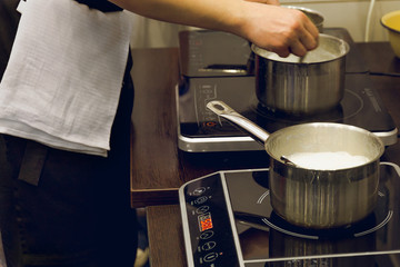Cook's hands preparing food