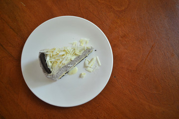 White chocolate cheesecake on a white plate