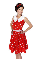 Photo of a girl in a red dress on a white background in the style of pin-up