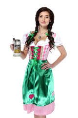 A full length portrait of a happy woman wearing a traditional october fest costume holding a beer glass Isolated on white background