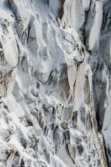 Surface hoar ice crystals formed on rockface in winter