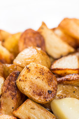 Macro closeup fried young potatoes with blurred background