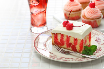 homemade cherry poke cake, cherry cupcake and shirley temple cocktail
