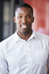 Vertical portrait of young black man smiling