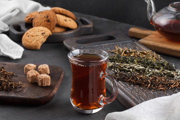 Cup of tea, still life on a dark background