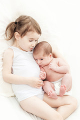 elder sister with the newborn child