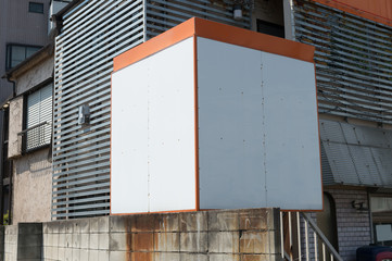 Large blank billboard on a street wall, banners with room to add your own text