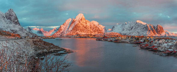 Panoramic view to Reinefjorden with mountains on background at sunrise - Reine, Lofoten Islands, Norway - 145974360