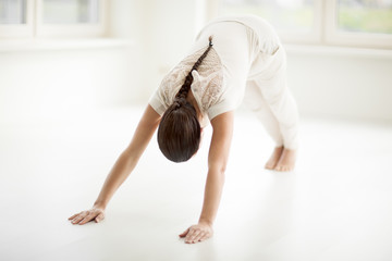 Woman Doing Yoga In Room