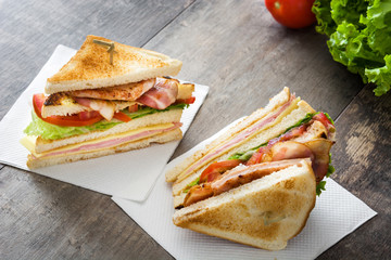 Club sandwich on wooden table 
